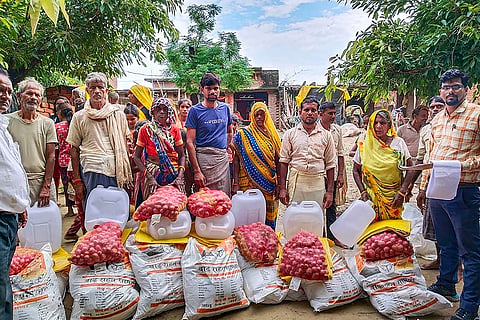 Flood affected people receive ration kits in UP